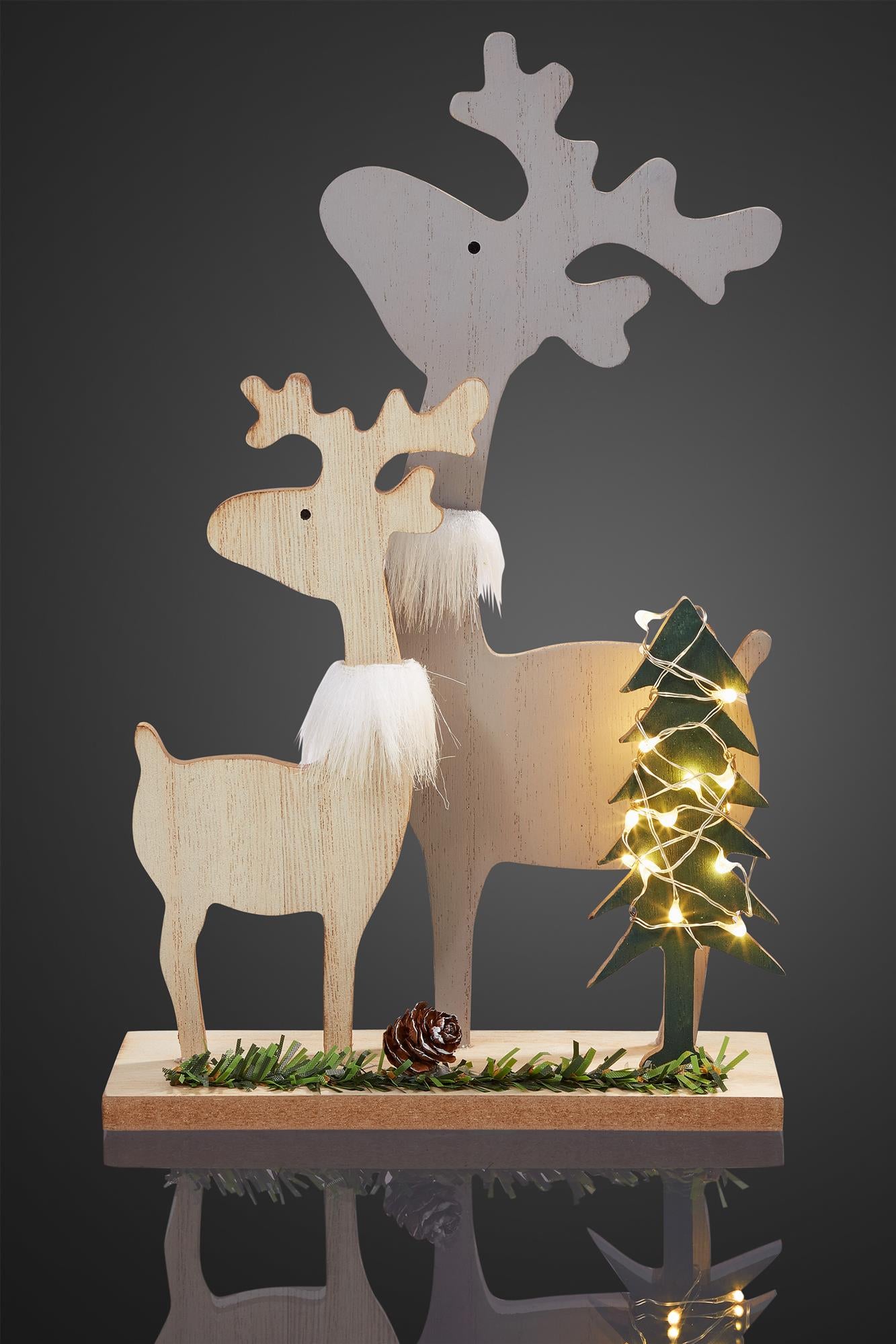 LED Holz-Rentier-Familie, 10 LEDs ww, 17x7x27 cm, mit Timer, batteriebetrieben