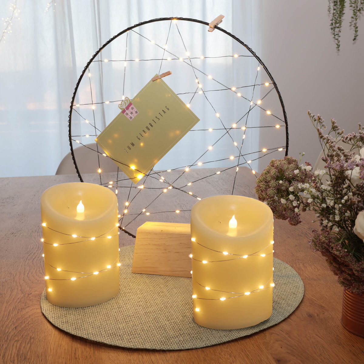 LED Wachskerze mit Lichterkette 2er Set innen, warmweiß, Ø 10 cm x 15 – Hellum Direkt
