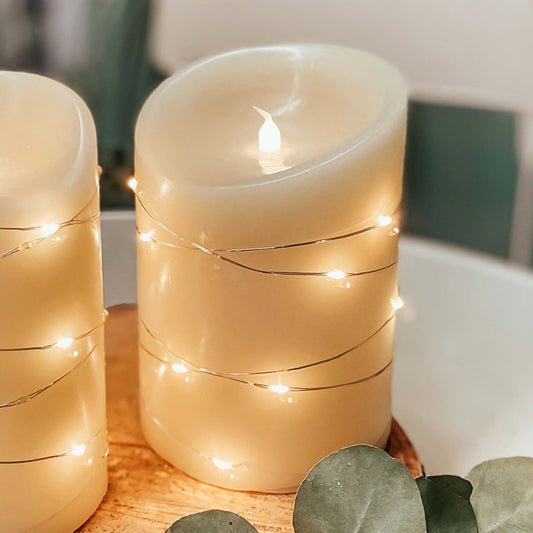 LED-Wachskerze mit Lichterkette "Tautropfen" , H 15cm, D 10cm, 29 + 1 LEDs ww, batteriebetrieben