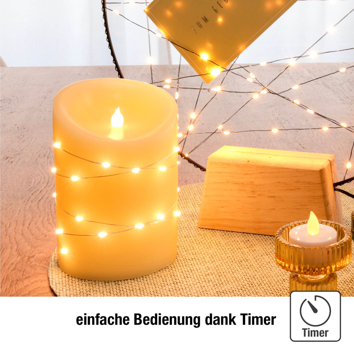 LED-Wachskerze mit Lichterkette "Tautropfen" , H 15cm, D 10cm, 29 + 1 LEDs ww, batteriebetrieben