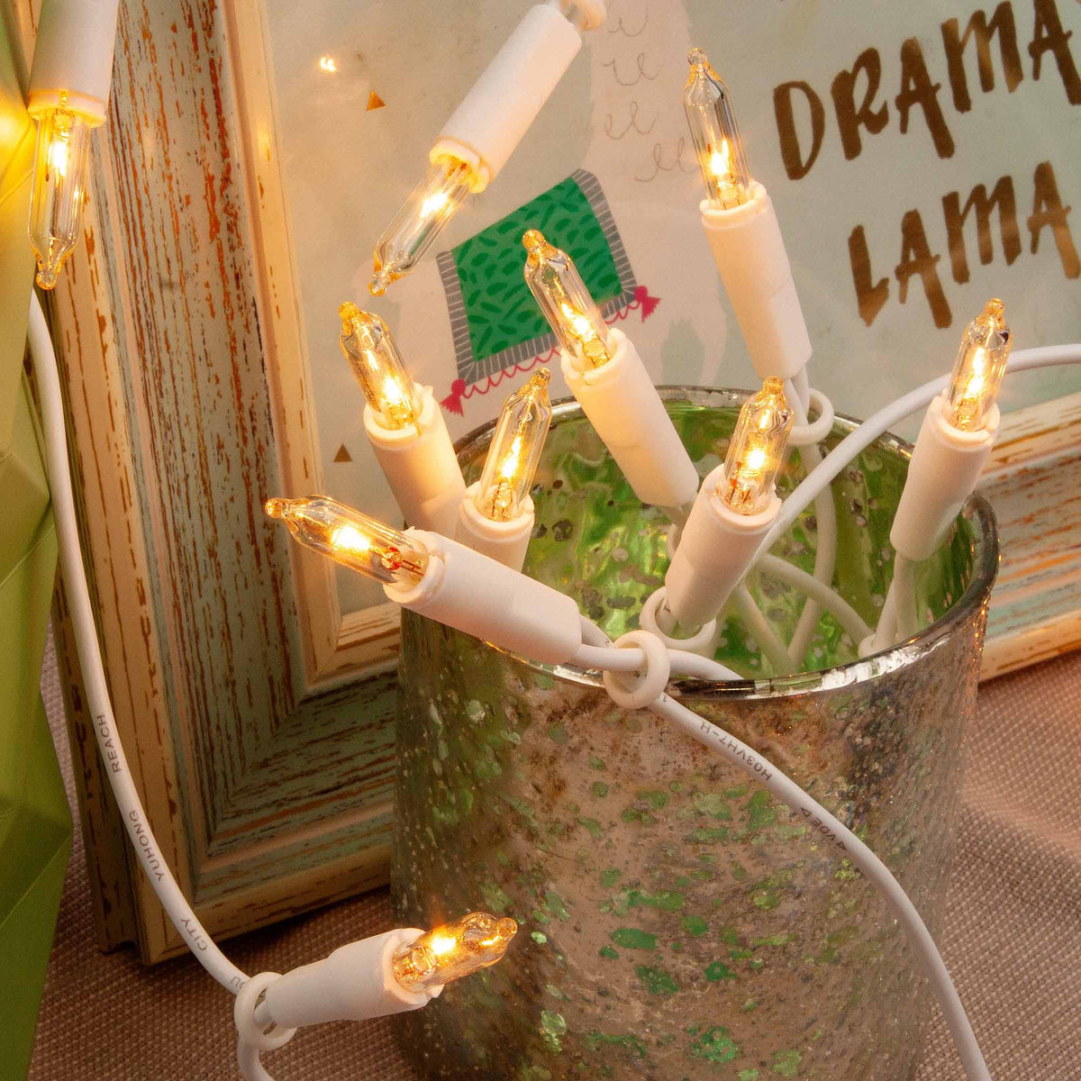 Lichterkette innen, 10 Lichter warmweiß, 1,35 m beleuchtet, weißes Kab – Hellum Direkt